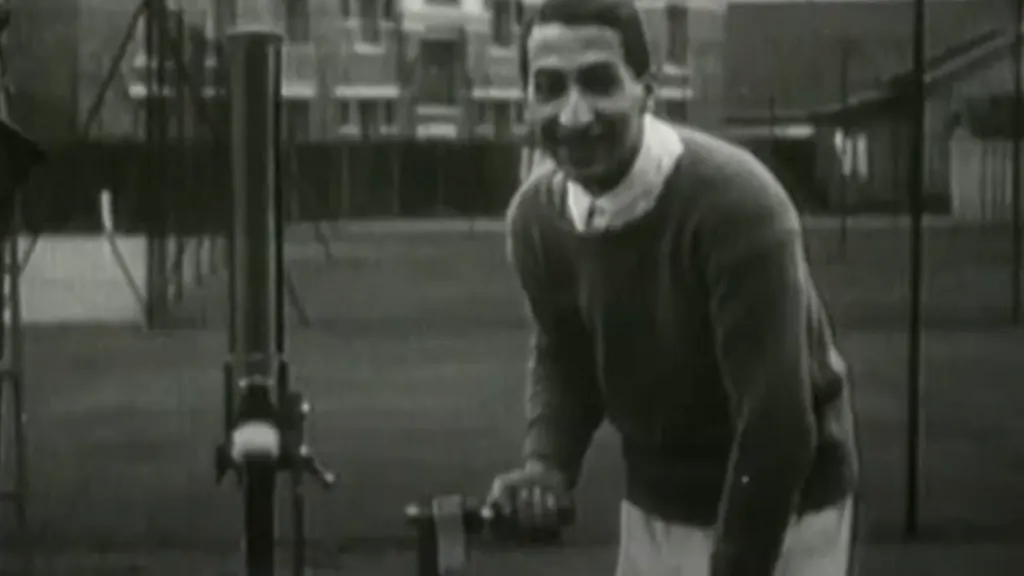 Rene Lacoste with an early tennis ball machine