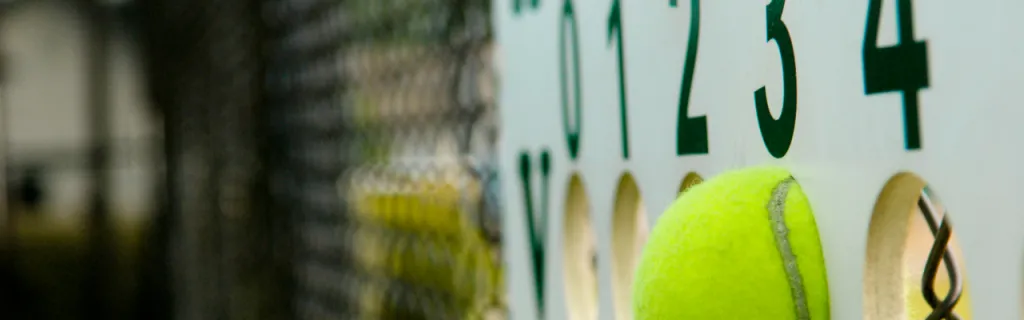 A detailed tennis scoring display showing games and sets won by each player